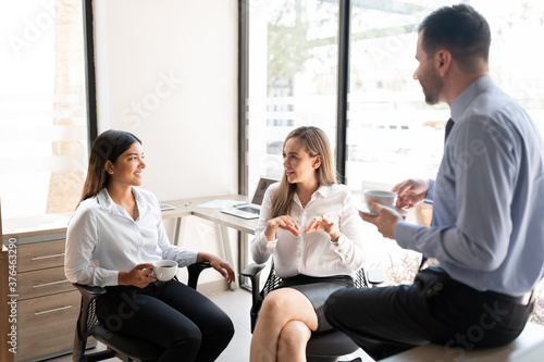 Business team having a casual talk during break