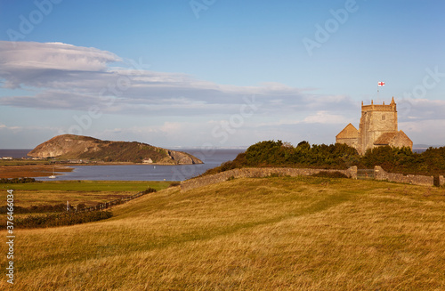 A view of St. Nicholas' Church and onward to Brean Down, from Uphill, Weston-super-Mare, on the coast of Somerset, England