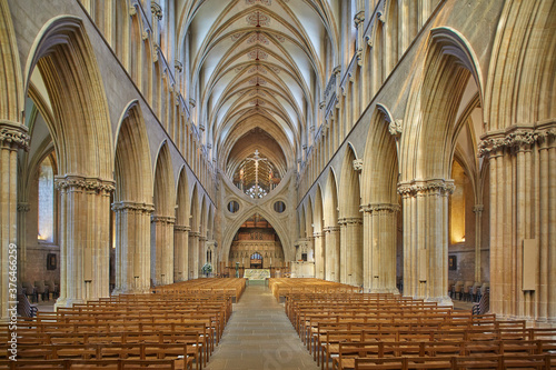 The central nave in historic Wells Cathedral, in Wells, Somerset, England photo