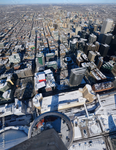 Photography Birds eye view of downtown highrises and Toronto North in winter