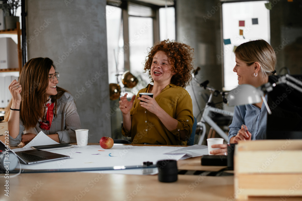 Businesswomen working on a new project. Colleagues discussing about problem they have to solved. Businesswomen working on a new project. Colleagues discussing about problem they have to solved.