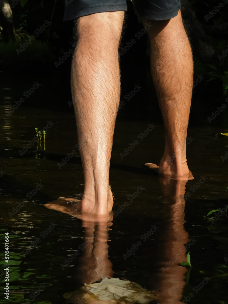 view of the back of ones foot in the water view of the back of ones foot in the water