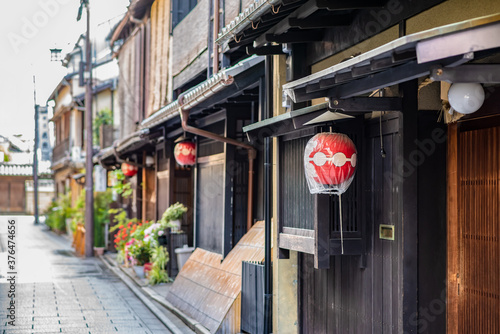 A paper lantern at a machiya home in Kyoto Japan. Beautiful architecture in Gion, the historic geisha district.