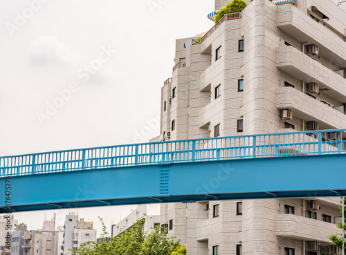 Photography Beautiful blue pedestrian bridge in the Nakameguro area of Shibuya in Tokyo, Japan
