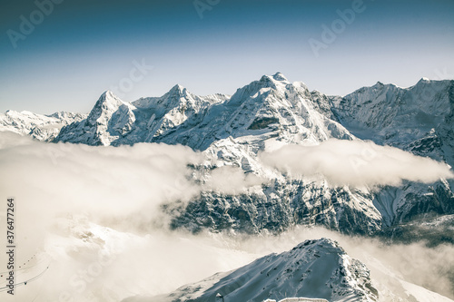 amazing snow covered peaks in the Swiss alps Jungfrau region from Schilthorn