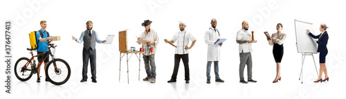 Group of people with different professions isolated on white studio background, horizontal. Modern workers of diverse occupations, male and female models like accountant, butcher, deliveryman, teacher