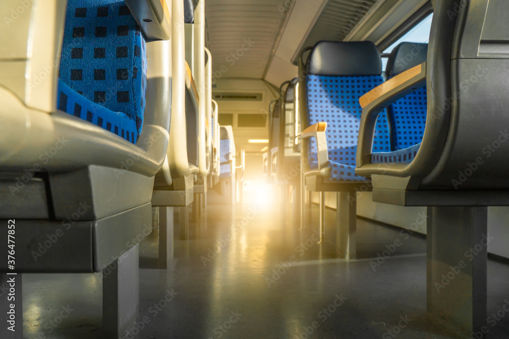 Obraz premium Clean hygiene empty seat on europe Germany public transportation train subway bus with sunlight for traveler to travel during vacation with nature view on window