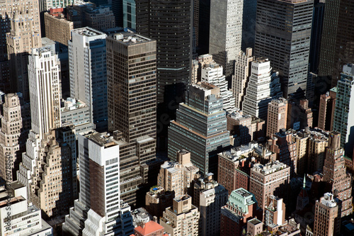 Detailed aerial shot of famous New York skyscrapers, impressive vertical architecture and real estate portfolio, headquarters of the most iconic businesses and brands in the world, Manhattan, NYC, USA