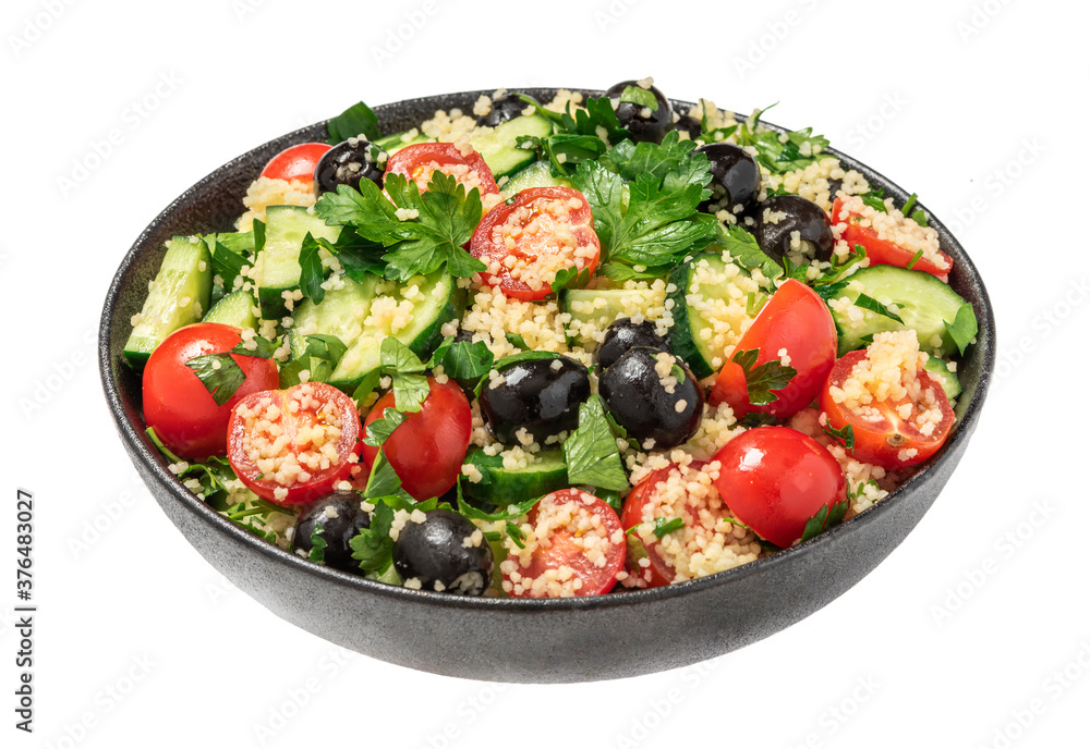 Salad of couscous and vegetables in a bowl isolated on a white background. Tabbouleh of couscous, tomatoes, cucumbers, parsley and olives. Arabic or African cuisine.
