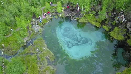 geyser lake in Altai with tourists drone view