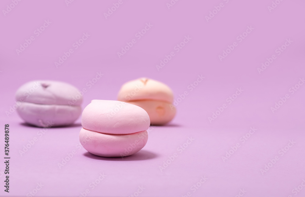 airy sweet vanilla marshmallow pastel color on lavender background with copy space airy sweet vanilla marshmallow pastel color on lavender background with copy space