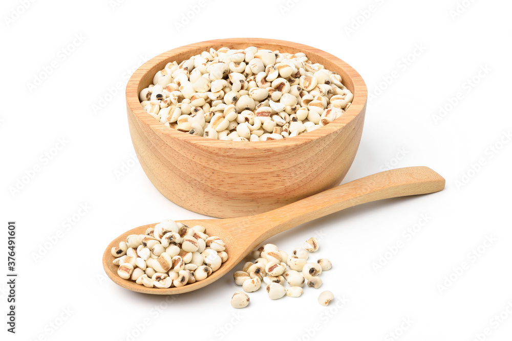 Job's tears ( Adlay millet) in wooden bowl and wooden spoon isolated on white background. Job's tears ( Adlay millet) in wooden bowl and wooden spoon isolated on white background.