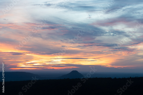 beautiful orange, pink and blue sky at the sunrise with moutain view. landscpae concept