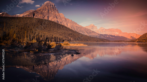 sunset over the lake with mountain