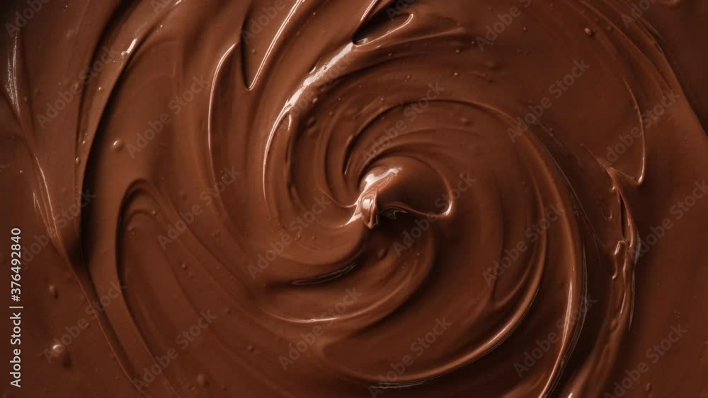melted premium dark chocolate top view rotating melted premium dark chocolate top view rotating
