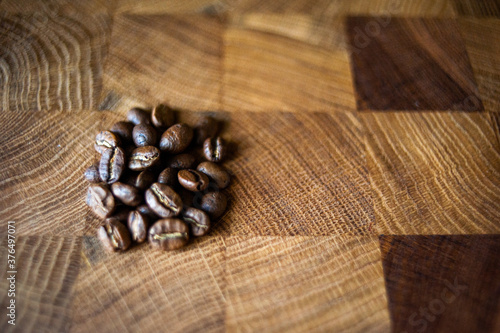 Coffee beans on a dark wooden board