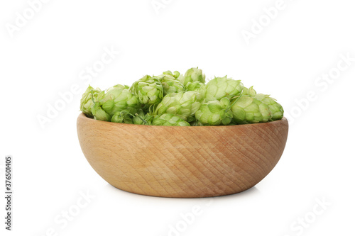 Wooden bowl with hop isolated on white background