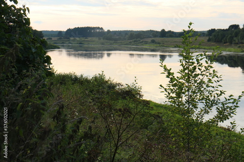 View of the river in the countryside at sunset © Andrey