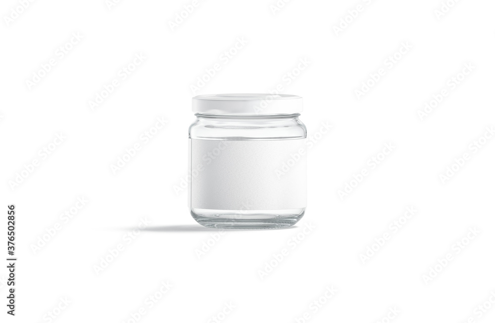 Blank small glass jar with white label mockup stand, isolated Blank small glass jar with white label mockup stand, isolated