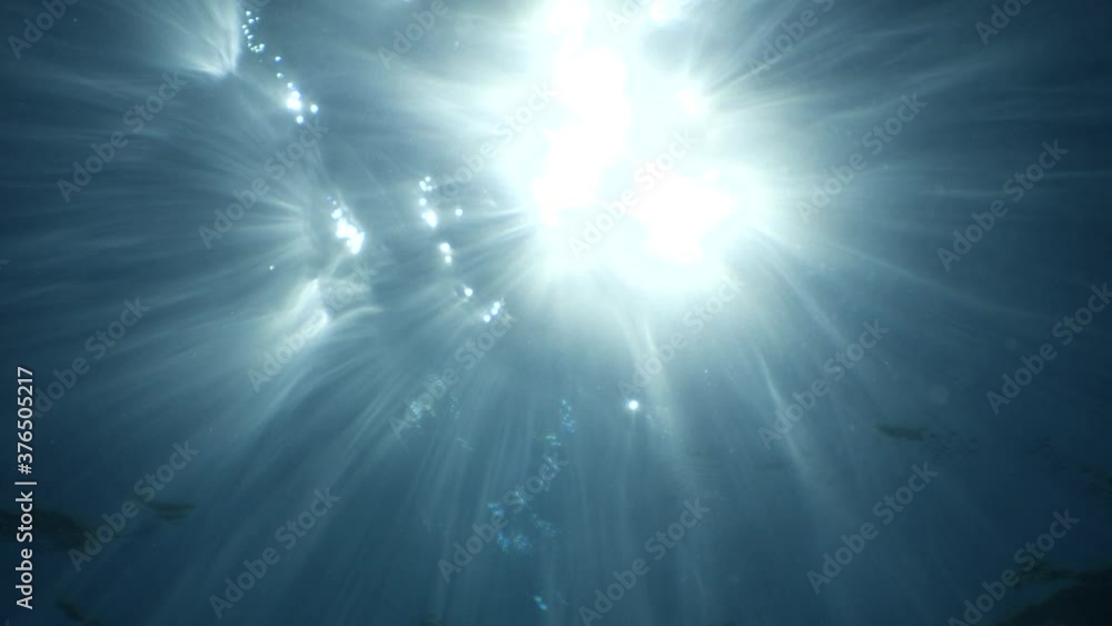 sun ray and sun beam scenery underwater waves on surface of water slow ocean scenery sun ray and sun beam scenery underwater waves on surface of water slow ocean scenery