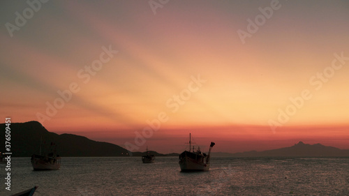fishing boat at sunset © edgardoavila