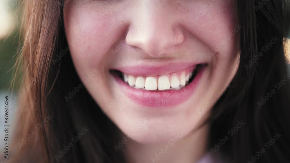 Close up of Smiling confident latin teen woman, college student in university campus looking at camera. Happy hispanic woman cute smile. Close up of Smiling confident latin teen woman, college student in university campus looking at camera. Happy hispanic woman cute smile.