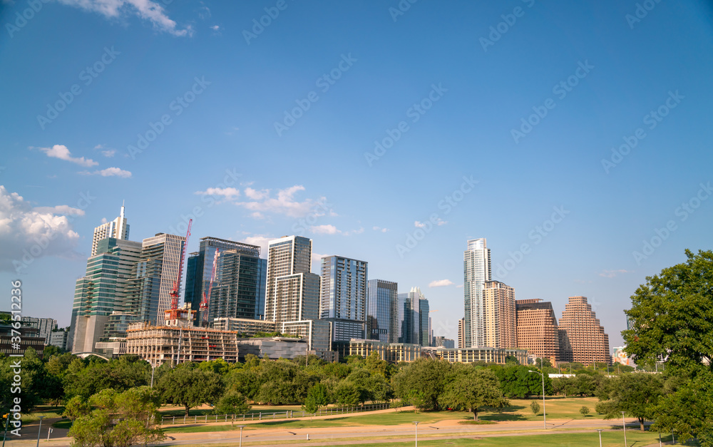 Fototapeta premium Wide Angle View of Austin Texas Skyline With Mostly Clear Skies in a summer Evening - editted