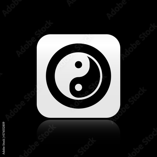 Black Yin Yang symbol of harmony and balance icon isolated on black background. Silver square button. Vector.