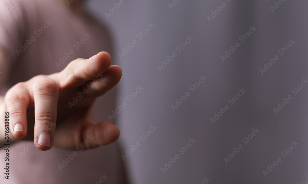 Naklejka premium A man hand touching virtual screen, modern background concept , can put your text at the finger, copy space.