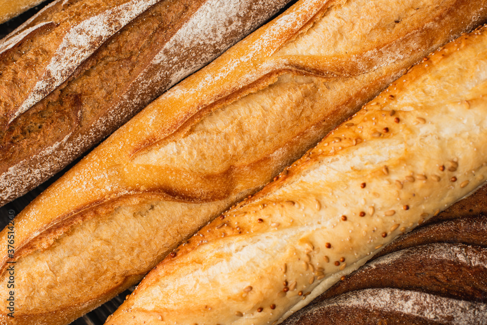 close up view of fresh baked baguette loaves