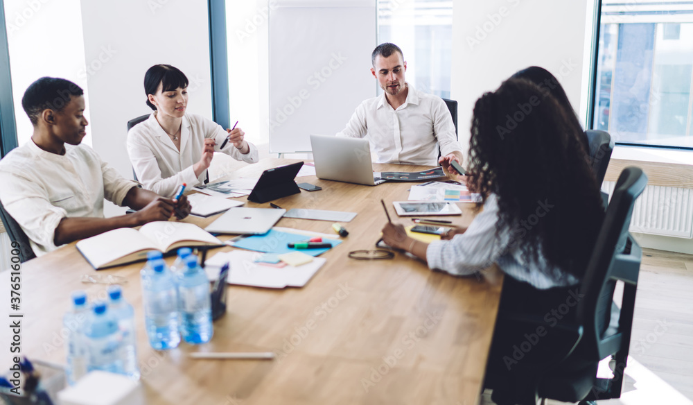 Work team having session in meeting room