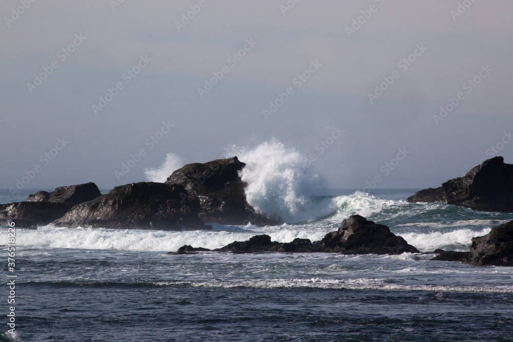 Rocks greeting the waves