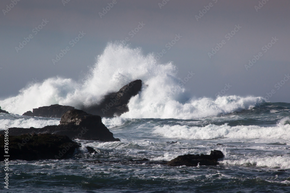 Rocks greeting the waves
