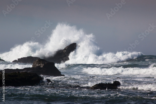 Rocks greeting the waves