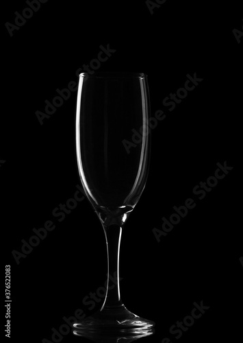 Empty wine glass on black closeup