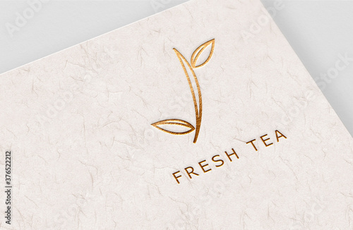 Gold Colour Logo Design In A Paper Sheet