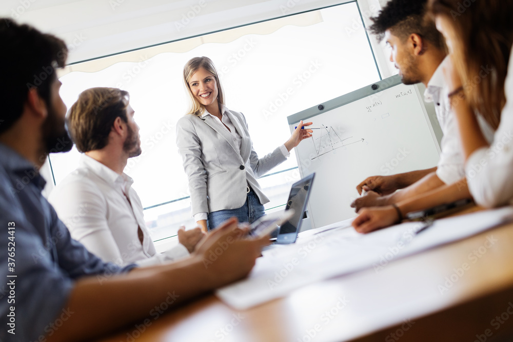 Entrepreneurs and business people working together in office Entrepreneurs and business people working together in office