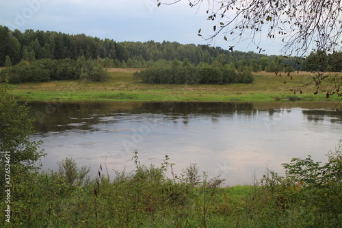 View of the river in the countryside at sunset