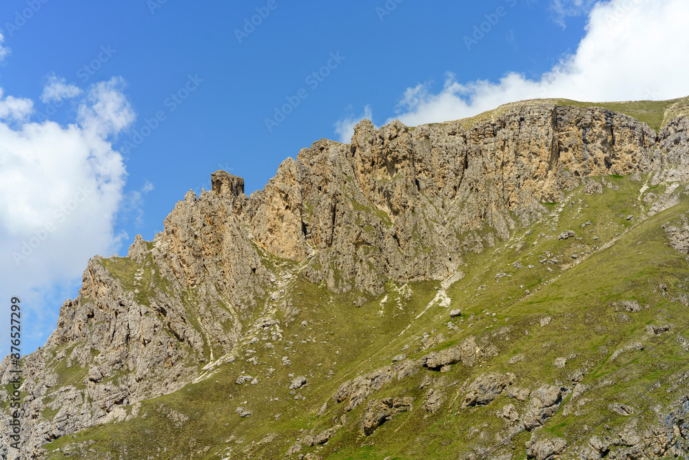Mountain landscape along the road to Pordoi pass, Dolomites Mountain landscape along the road to Pordoi pass, Dolomites