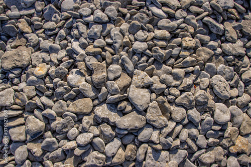 Rock textured background with stones and pebbles