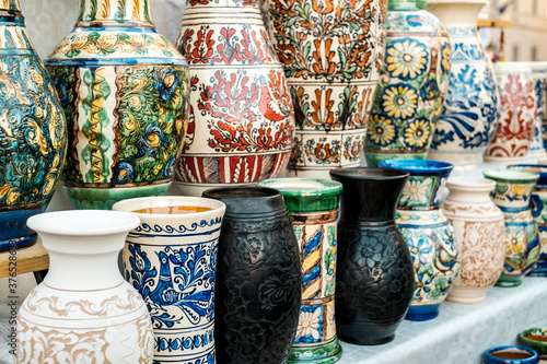 Happy colorful ceramics. Traditional Romanian handmade ceramics market at the potters fair from Sibiu, Romania