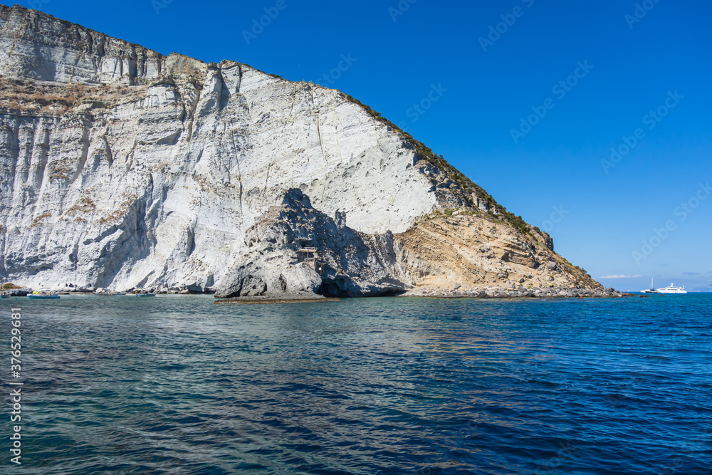 The bay of the seagull's nest along the rocky coast of Palmarola island (Ponza, Latina, Italy). The bay of the seagull's nest along the rocky coast of Palmarola island (Ponza, Latina, Italy).