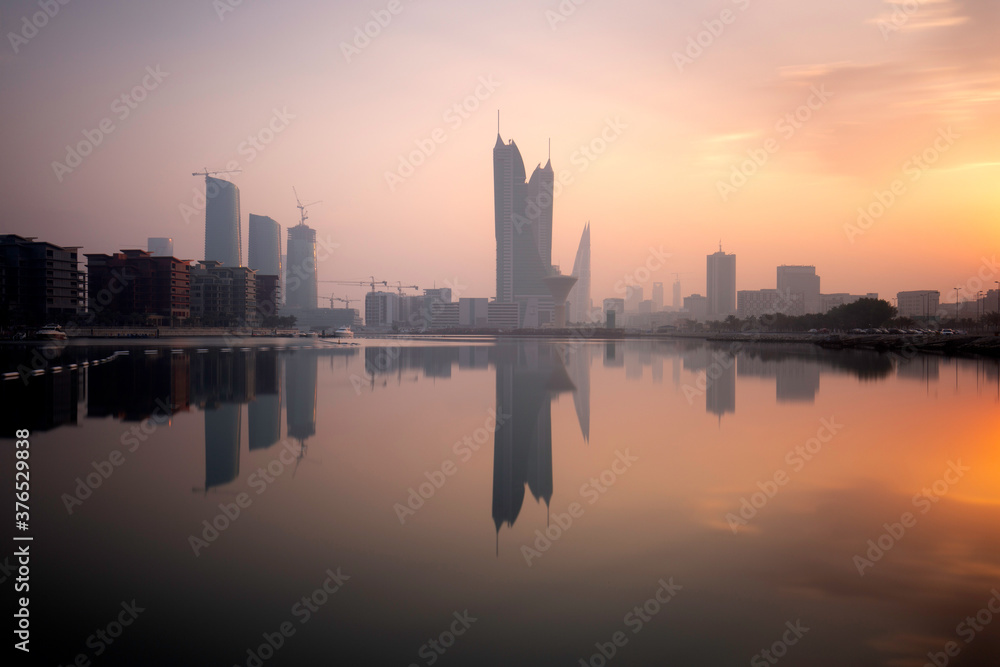 Bahrain skyline during sunrise with beautiful hue in the sly