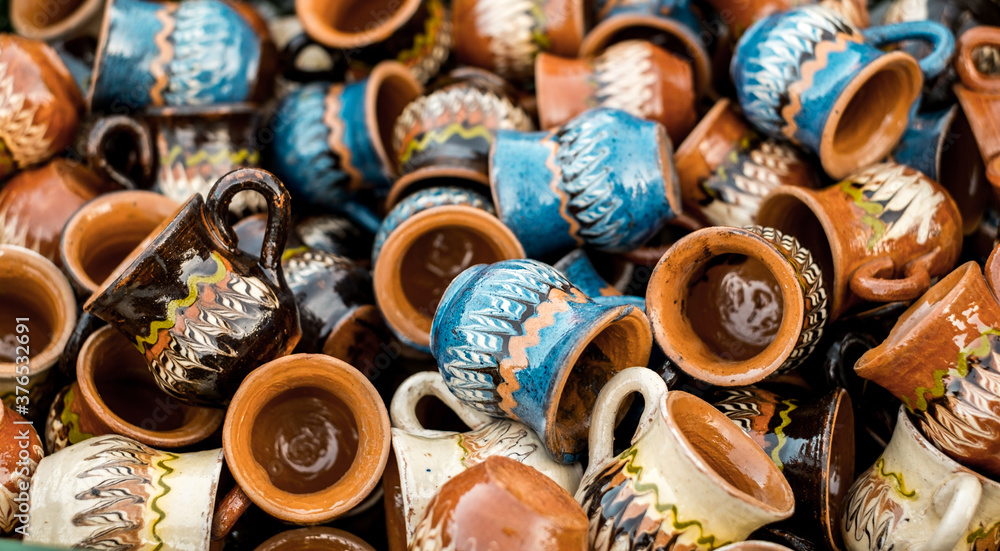 Happy colorful ceramics. Traditional Romanian handmade ceramics market at the potters fair from Sibiu, Romania