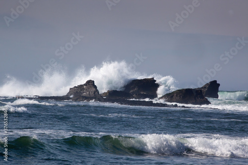 Ocean waves crashing on the rocky shore