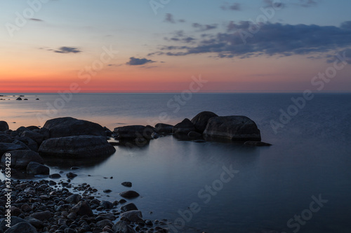 Rocky shore and peninsula of Baltic sea at sunset. Nordic minimalistic wilderness. © yegorov_nick