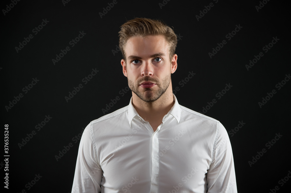 Expert haircare. Handsome guy with stylish haircut dark background. Hair care and styling cosmetics. Mens hair products. Salon haircare. Barbershop. Beard grooming. Shampoo and conditioner Expert haircare. Handsome guy with stylish haircut dark background. Hair care and styling cosmetics. Mens hair products. Salon haircare. Barbershop. Beard grooming. Shampoo and conditioner