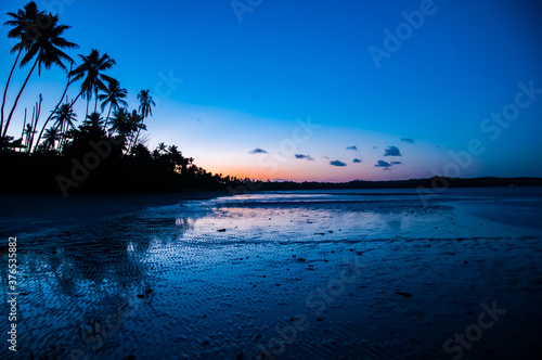 tropical island at sunset