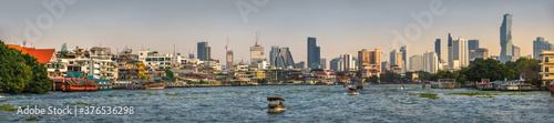 Bangkok Cityscape as Seen from the Boat on Chao Phrtaya River