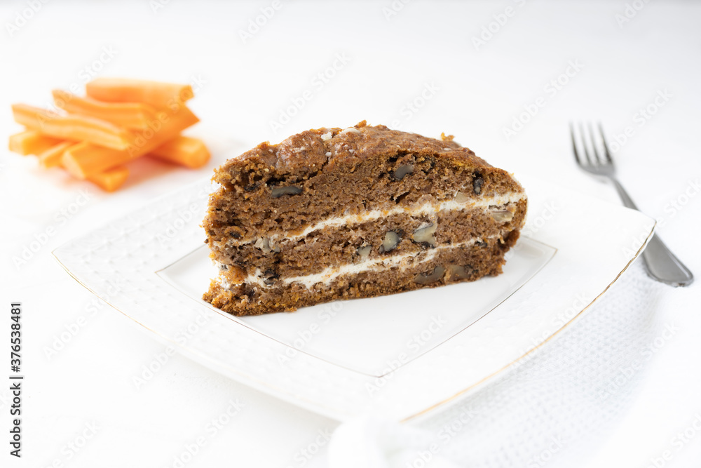 Slice of carrot cake and coffee on white background Slice of carrot cake and coffee on white background